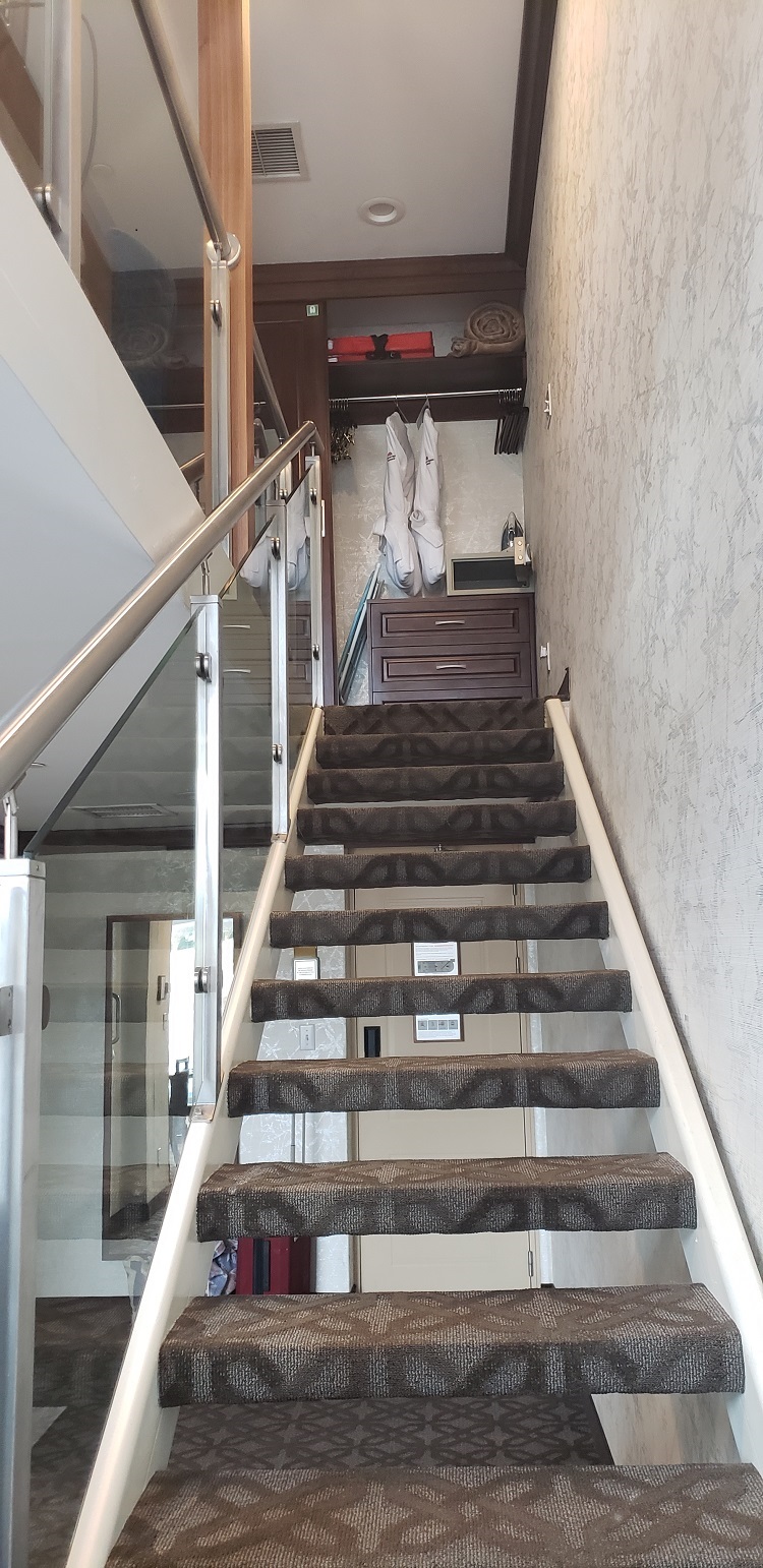 Stairs to the loft's master bedroom, bath, and closet/storage space.. Photo by Susan J. Young.