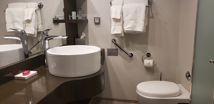 First-level guest bathroom in AQV's Two-Level Loft Suites. Photo by Susan J. Young