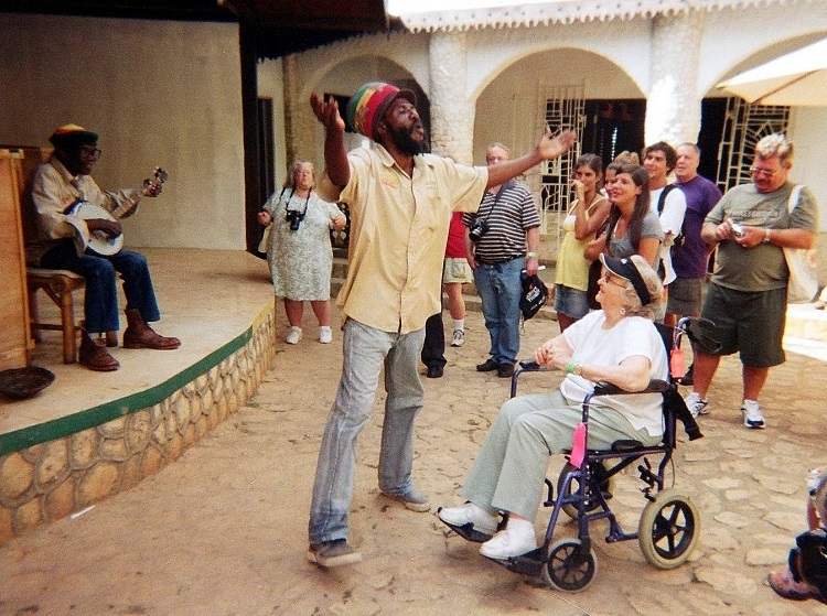 A cruise group enjoys a Bob Marley themed tour to the reggae musician's former home in Jamaica's Highlands. Photo by Susan J. Young