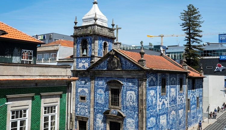 Lovely blue tiles grace the exterior of the Capela das Almas in Porto, Portugal. Photo by the Porto Convention & Visitors Bureau.