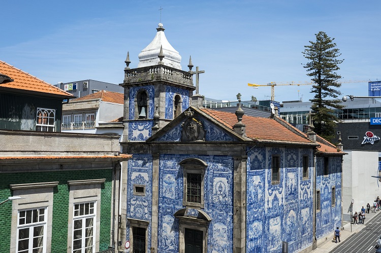 Guests visiting Porto, Portugal, on a new Viking cruise can head out to view the lovely Capela das Almas sports an exterior of blue tiles. Photo by Porto Convention &amp; Visitors Bureau