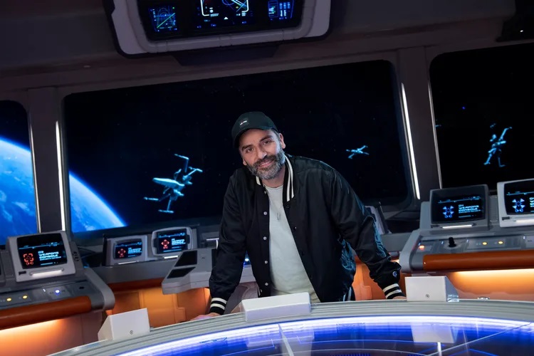 Actor and producer Oscar Isaac stands on the Bridge of the Halcyon starcruiser inside Star Wars: Galactic Starcruiser at Walt Disney World Resort in Lake Buena Vista, Fla., prior to the March 1, 2022, debut of this first-of-its-kind, two-night immersive vacation experience. (David Roark, photographer)