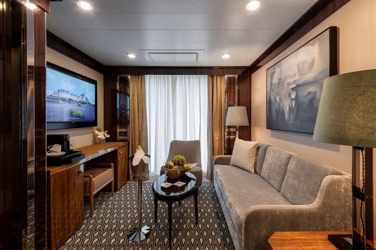 A Navigator Suite's living room area. Photo by Atlas Ocean Voyages.