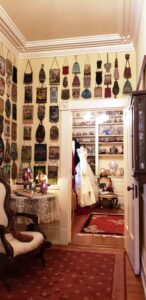 Collection of Beaded Purses on the walls inside The Towers in Natchez, MS. Photo by Susan J. Young.