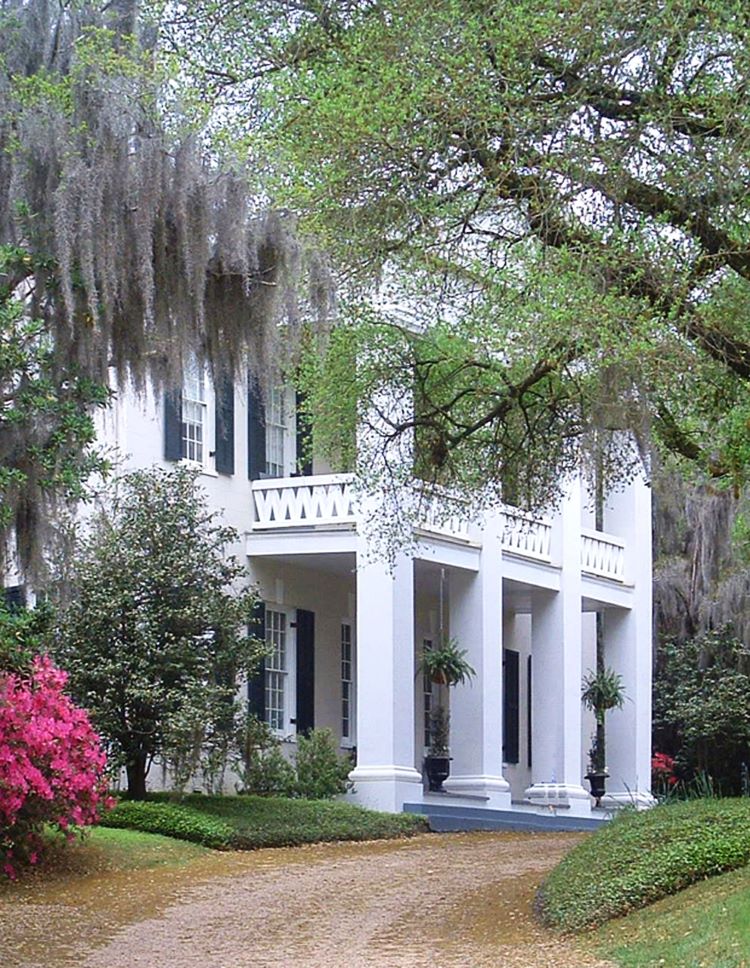 The stately Monmouth is a popular historic home that visitors tour in Natchez, MS. It has lush gardens too. Photo courtesy of Visit Natchez.