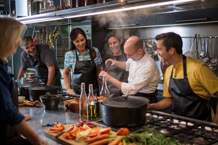 Avalon Waterways' guests often can participate in shore excursions that are foodie-focused, such as this cooking class ashore. Photo by Avalon Waterways. 