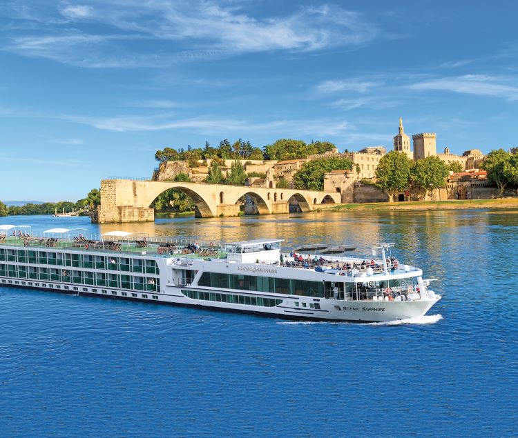 Scenic Sapphire is shown near the famous bridge in Avignon, France. Photo by Scenic.