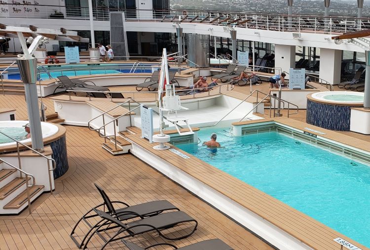 Celebrity Edge's top deck pool is less crowded at certain times so guests desiring to do laps should talk to crew members about the best time to hit the water for that. Photo by Susan J. Young