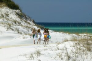 A new Florida regional beach access point in South Walton County will open in early summer. Here are girls walking to one of South Walton County's many beaches. Photo by South Walton County, FL. County.