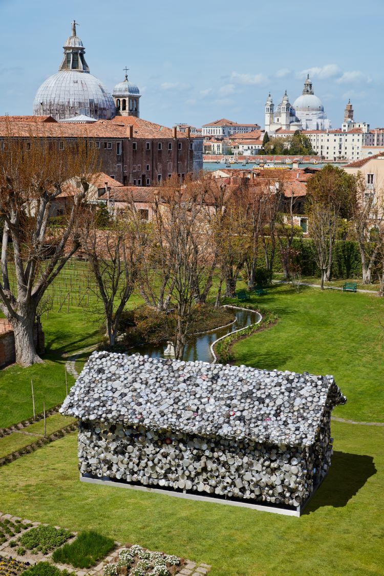 Subodh Gupta has created a house of pots, pans and utensils for the gardens of the Cipriania Hotel in Venice. Photo by Belmond. 