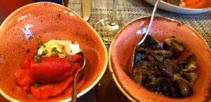 Red peppers and mushrooms were among the "sides" at Cuadro 44. Photo by Susan J. Young