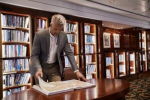 QM2's library boasts the most books at sea on any cruise ship. Photo by Cunard Line. 