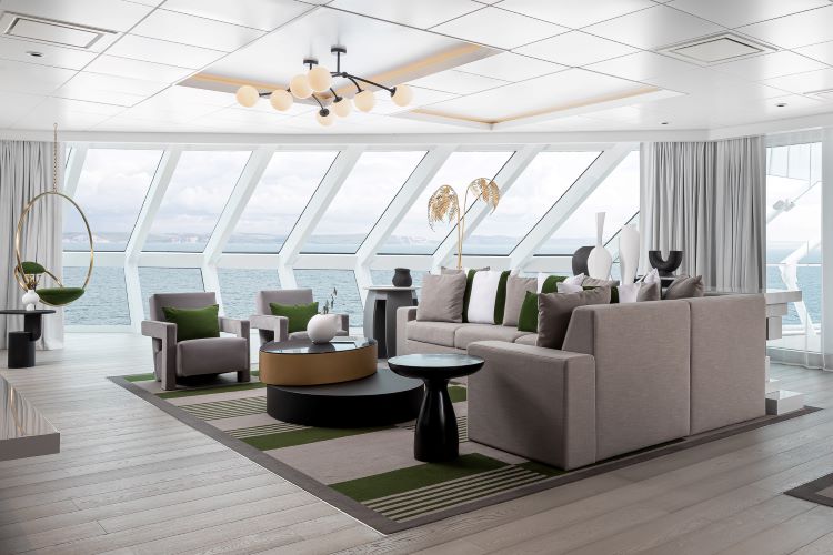 The living room of the Iconic Suite on Celebrity Beyond. Photo by Celebrity Cruises.