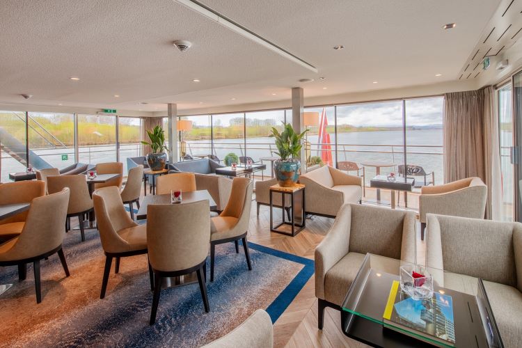 A great way to relax after a day ashore is to head to one of the relaxing lounges on board Avalon Waterways' river vessels. A Club Lounge is shown above. Photo by Avalon Waterways. 