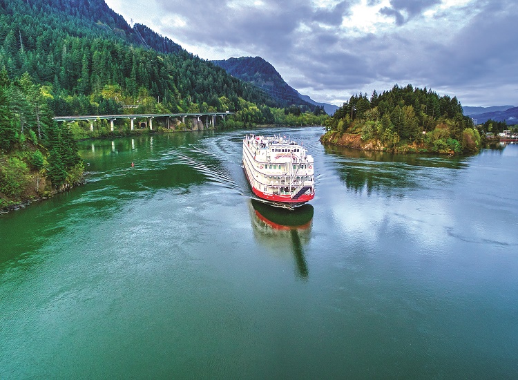 American Empress is among the small ships sailing the Columbia and Snake rivers of the Pacific Northwest. It's shown here near The Dalles. Photo by American Queen Voyages.