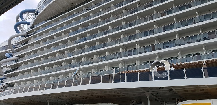 One of the slides is visible on the left side of this mid-ship shot, taken from Pier 88 at the Manhattan Cruise Terminal. Photo by Susan J. Young. 