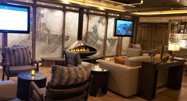 Expedition Lounge with faux fireplace and comfortable seating areas. Photo by Susan J. Young.