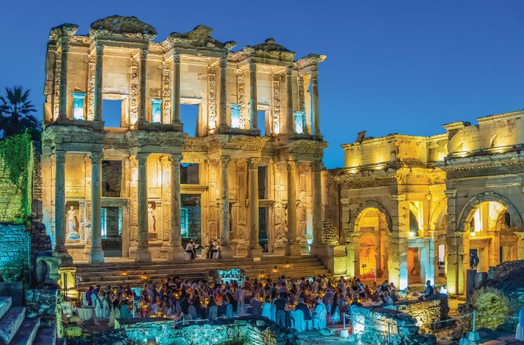 Tauck guests will be treated to a private dinner under the stars at the ancient Roman city of Ephesus and its famed library facade. Photo by Tauck.