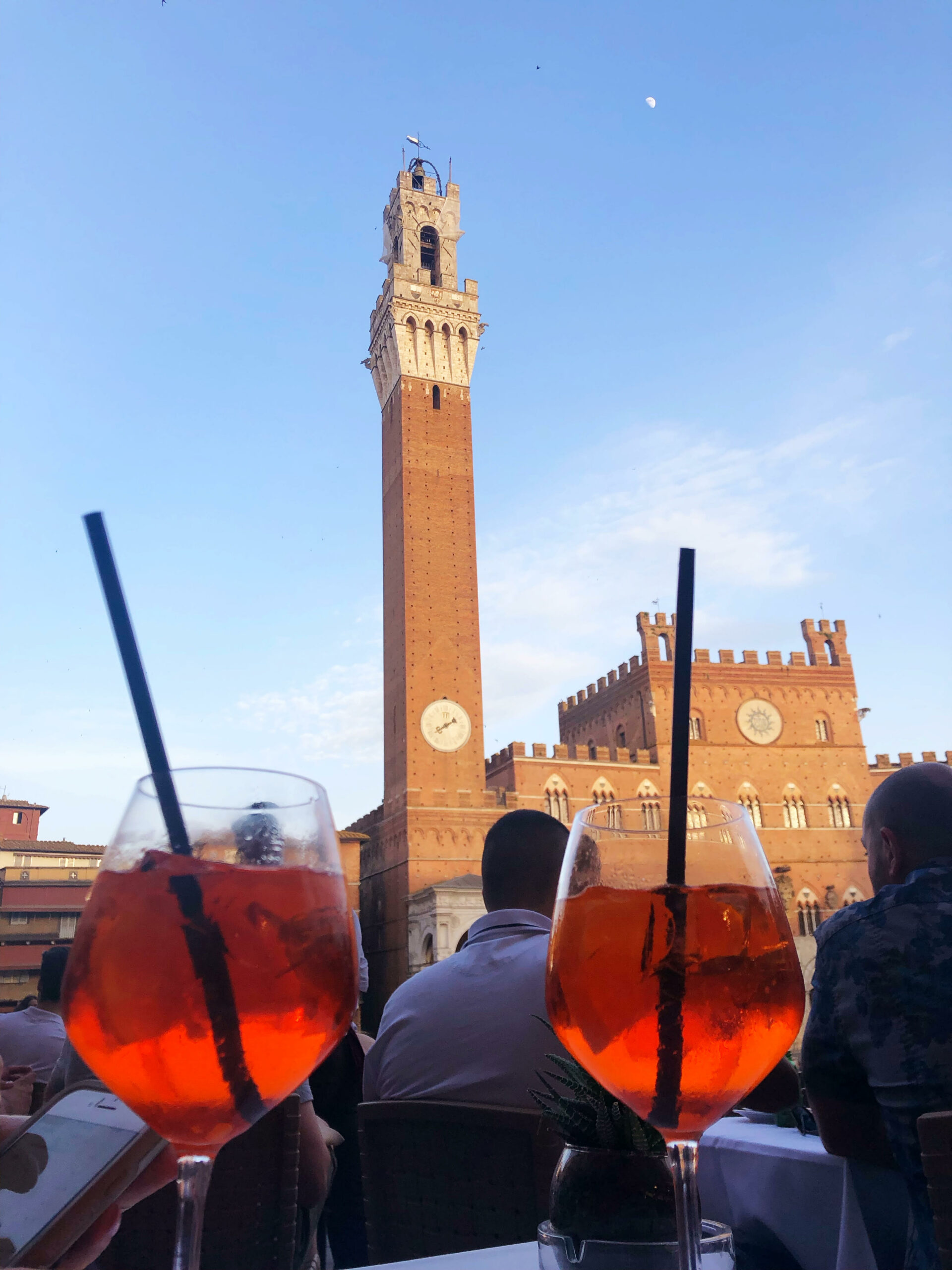 Living "Le Dolce Vita"at a cafe on a historic Siena square is a way to soak up the good vibes of Italian culture. Photo by Anita Dunham-Potter