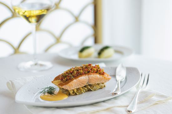 Grilled salmon at Chartreuse restaurant on Regent Seven Seas Cruises. Image provided by Regent Seven Seas Cruises.