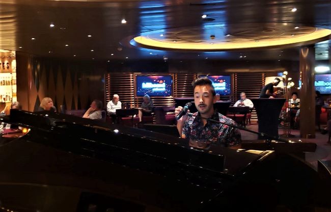 Billboard Onboard features two different singers/piano players. Photo by Susan J. Young.