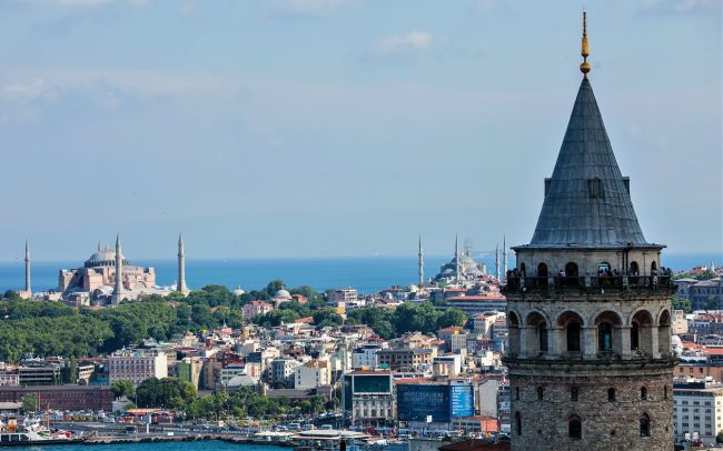 Istanbul's Galata Tower is in the foreground, with Aya Sofya (Hagia Sophia) at back left and the Blue Mosque at back right. Photo courtesy of GoTurkiye. 
