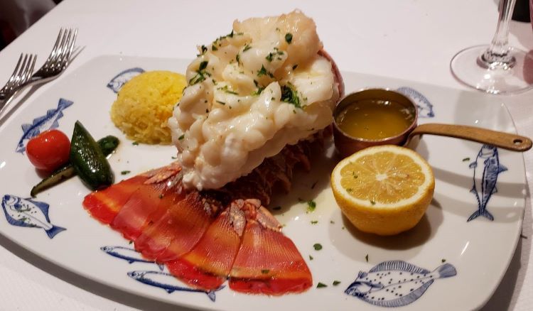 Lobster tail, an entree at Rudi's Sel de Mer, a specialty restaurant on Holland America's Rotterdam. Photo by Susan J. Young