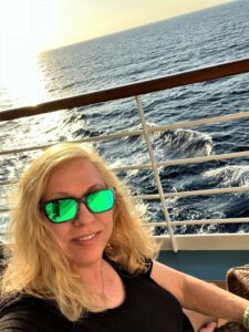 Personal travel planner Shari Bazzoni enjoys spending time on a cruise ship balcony and viewing the ocean waves. Photo by Shari Bazzoni. 