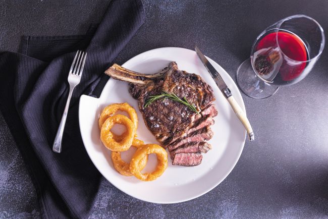 A tasty, aged USDA Prime steak awaits at Prime 7 on Regent Seven Seas' new Seven Seas Grandeur. Photo by James Arnold, courtesy of Regent Seven Seas Cruises.