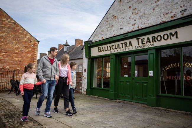 A family strolls through the Ulster Folk Museum. Copyright: @DonalMaloneyCredit Line: Courtesy of Tourism Northern Ireland