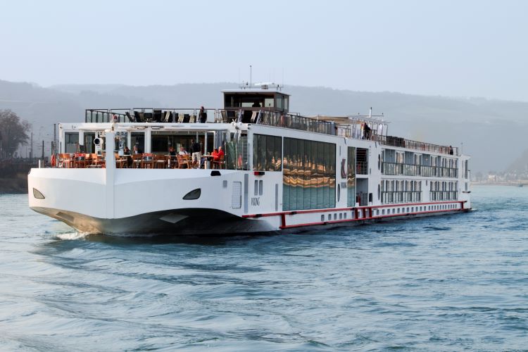 A Viking Longship sails Europe's Rhine River. The line will offer year-round cruising there starting in late 2023. Photo by Viking.