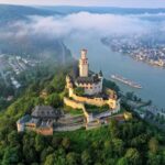 A Viking Longship sails along the Rhine River, providing castle views for guests. Photo by Viking