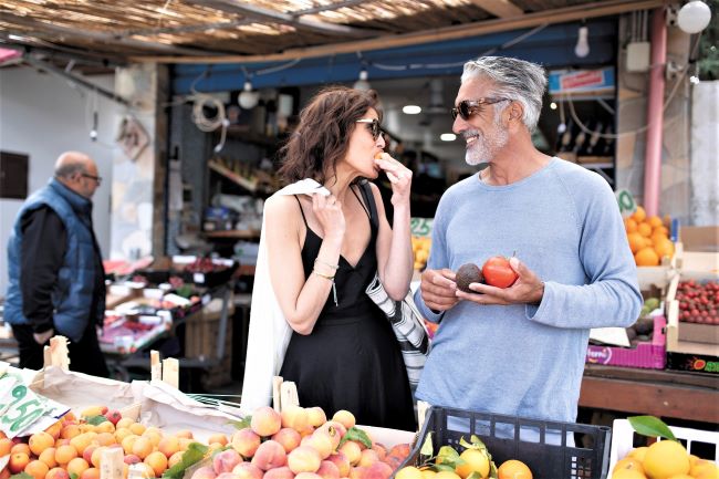 A couple explore a local market in the Mediterranean. Photo by James Arnold, Courtesy of Regent Seven Seas Cruises.