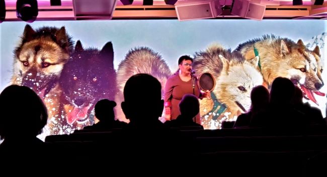 One member of Greenland's local Inuit community came aboard Seabourn Venture to provide a cultural enrichment program for guests in the ship's Discovery Center. Photo by Susan J. Young.