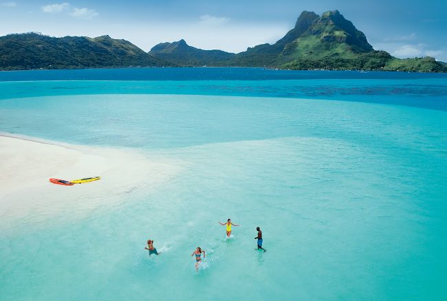 Idyllic isles such as Bora Bora and tropical experiences await in the South Pacific on a Paul Gauguin Cruises voyage. Photo by Paul Gauguin Cruises. 