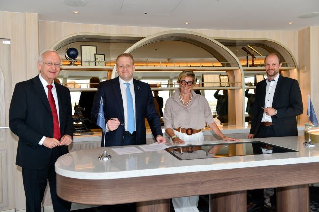 Silver Nova handover to Royal Caribbean Group executives including Jason Liberty and Barbara Muckermann. Photo by Silversea Cruises. 