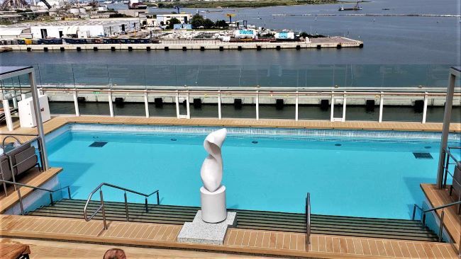 Silver Nova's asymmetrical design allows for an elongated pool along the starboard side. Guests have closer views of the water and landscapes. Photo by Susan J. Young. 