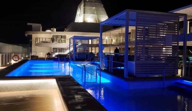 The gorgeous pool deck of Silver Novas is shown at night. Photo by Susan J. Young.