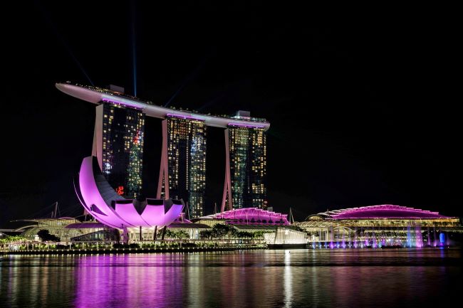 Nights are magical at the Marina Bay Sands with its SkyBar Observation Lounge and Infinity Pool 56 stories up -- and overlooking Singapore and Marina Bay at night. Photo by Marina Bay Sands. 