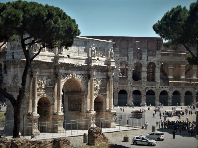 The Arch of Constantine with the Roman Colosseum in the background. Photo by Susan J. Young. 