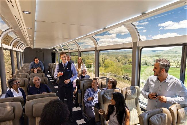 Guests on Tauck's new journeys that include the Rocky Mountaineer will have gorgeous views from a Dome Car, shown above in Colorado. Photo provided by Tauck.