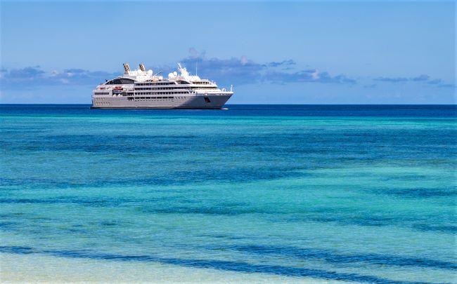 Ponant's small ship Le Lyrial is shown in the Indian Ocean at the Seychelles. Photo by StudioPonant-Laurence Fischer.