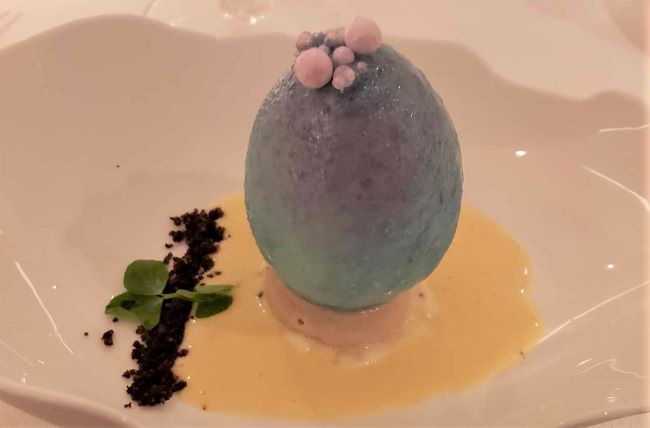 Seven Seas Grandeur has a priceless Faberge egg in a case at Reception, but also this tasty egg as dessert in Compass Rose. Photo by Susan J. Young. 
