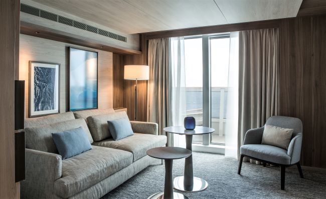 Guests sailing on Le Commandant Charcot can reach the geographic North Pole in comfort and style. One of the ship's suites is shown above. Photo by Ponant. 