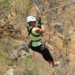 Rose Morrissey rides a zip line in Mexico. Photo by Rose Morrissey.