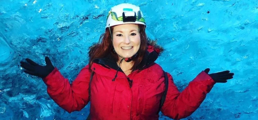 Fia Bauer, a personal travel planner for Pavlus Travel, believes in exploring the world and soaking in all its eco-beauty and culture. Here's she's shown in an ice cave. Photo by Fia Bauer.