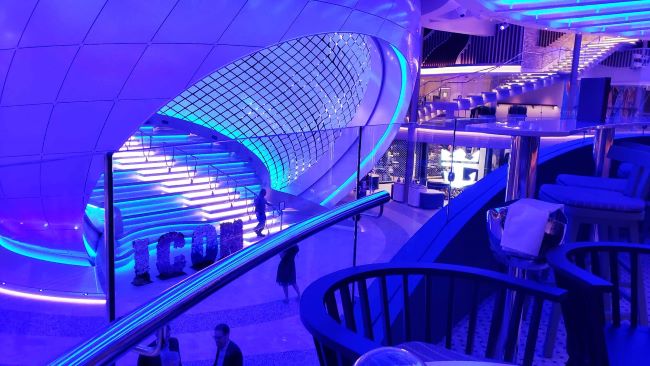 Icon of the Seas' Pearl is a grand staircase surrounded by a orb shaped structure with kinetic tiles. Photo by Susan J. Young