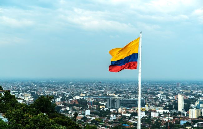 The Colombian flag flies over Bogota. Photo by PROCOLOMBIA.
