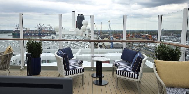 Among the many nooks and crannies where guests can relax and take in the views at the same time is this spot atop the ship. Photo by Susan J. Young.