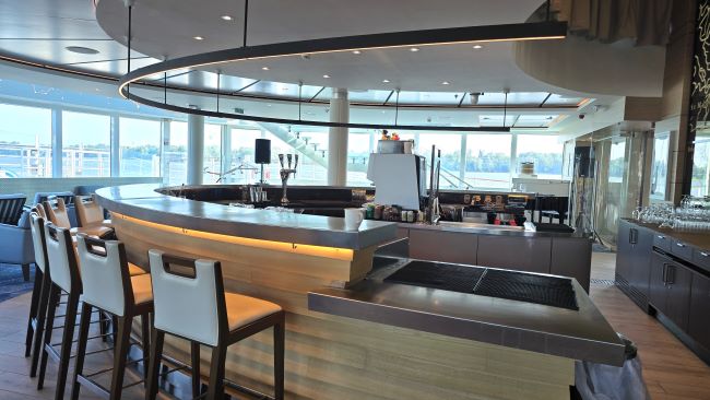 The full-service bar within the Explorers' Lounge on Deck 1 of Viking Mississippi. Photo by Susan J. Young. 